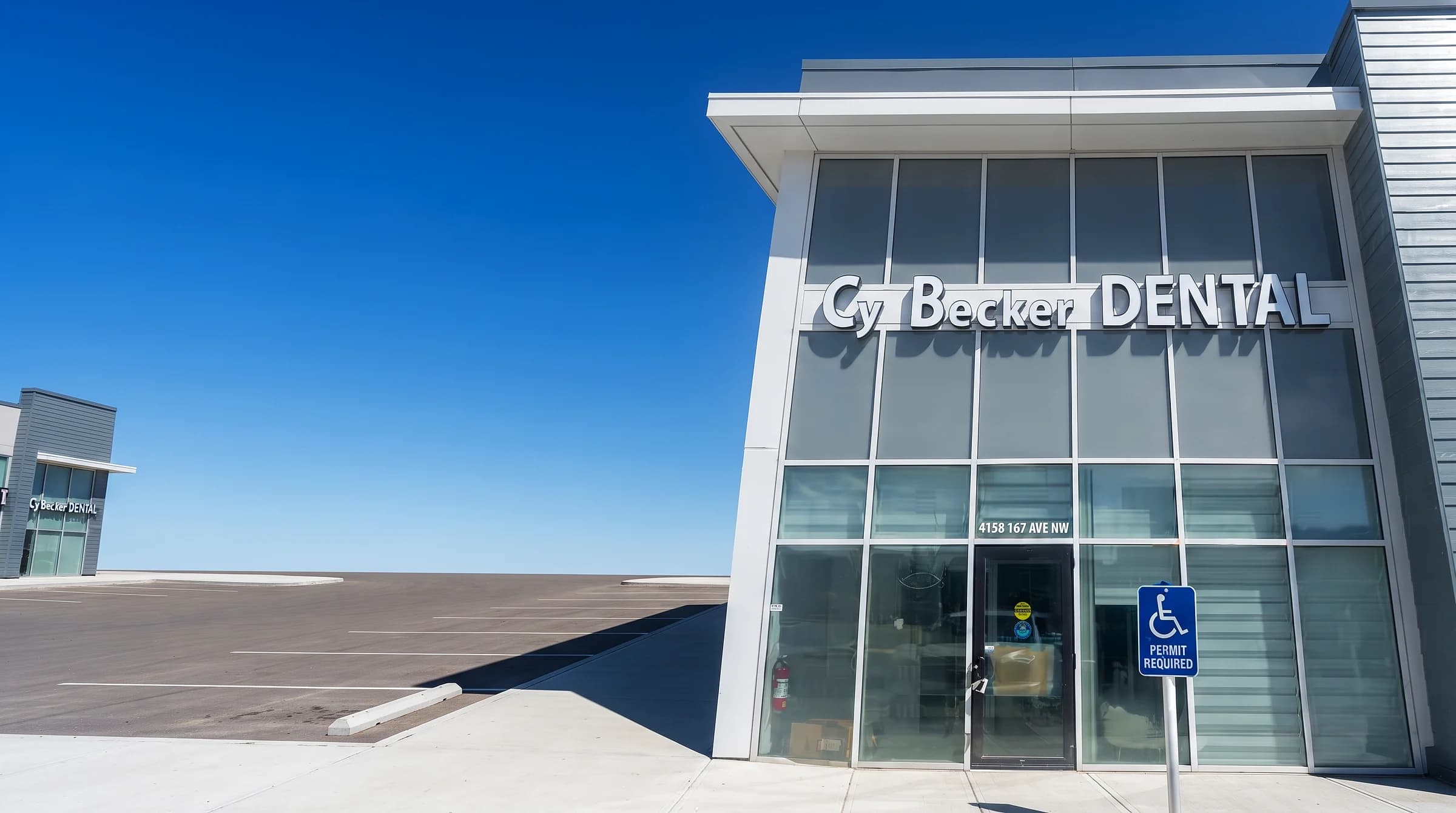 Exterior of Cy Becker Dental on 167 Ave NW in NW Edmonton, with signage and free on-site parking