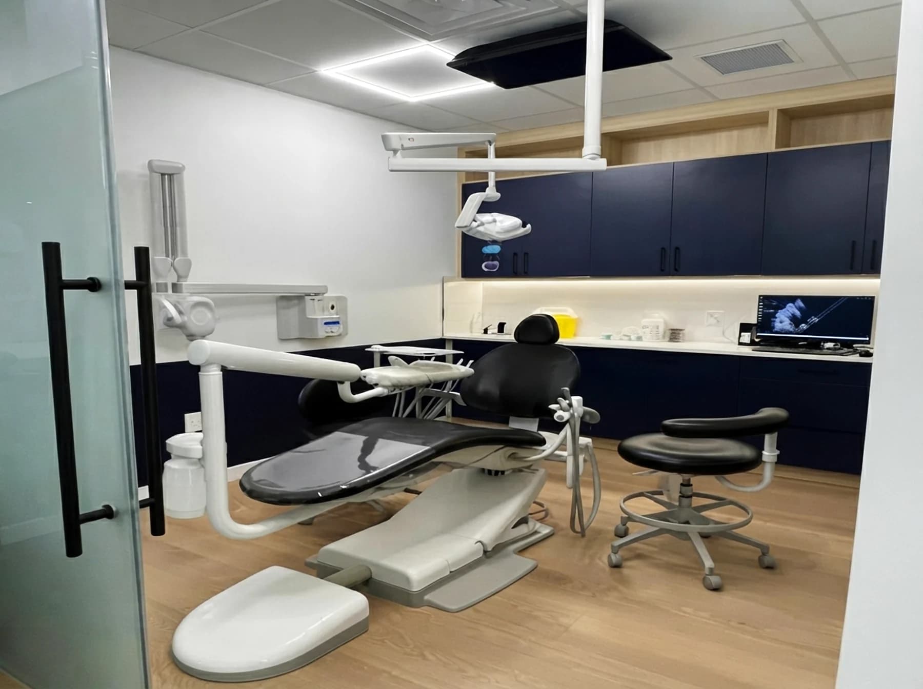 Dental operatory chair and digital imaging setup at Cy Becker Dental in Edmonton
