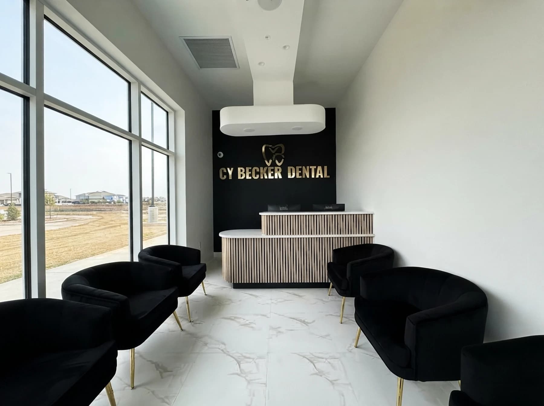Reception desk and waiting area at Cy Becker Dental in Edmonton, Alberta